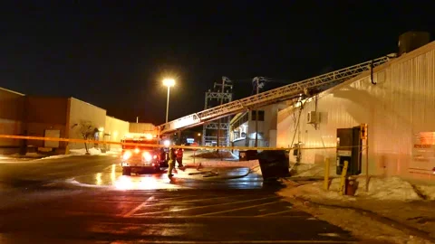 Fire ladder on-scene of a structure fire Stock Footage 139663807