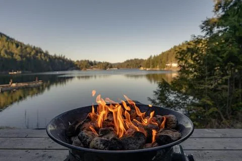 A   fire   by   the   lake Stock-Fotos