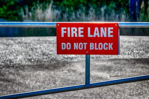 Fire lane do not block sign on a fence Stock Photos