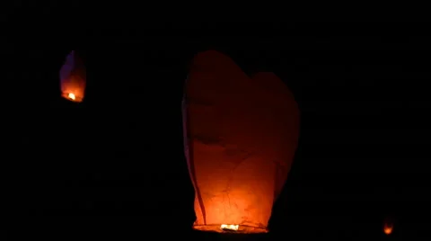 Fire Lantern Floating Night. Chinese Paper Fire Lanterns Floating on Air Stock Footage 65015586