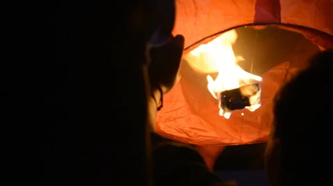 Fire Lantern Starting to Fly to the Sky Stock Footage 65015553