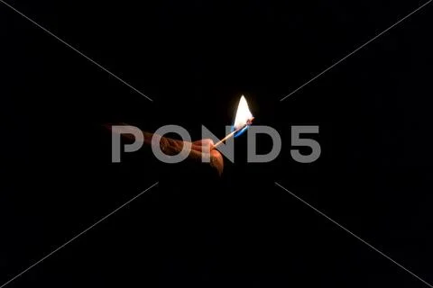 Fire to light the darkness Stock Photos