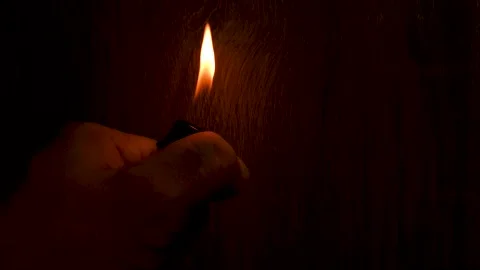 Fire, a lighter flame in the dark. Lighter flame. Stock Footage 278121898