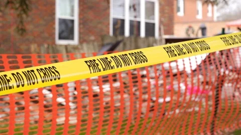 Fire Line do not cross tape blowing in the wind Vídeos de archivo 123983797