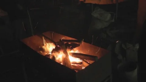 The Fire is Lit in the Grill, Chips and Firewood Stock Footage 73637704