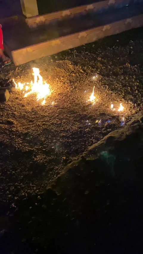 Fire that lives on the ground. This fire is blue when lit. Stock Footage 299249145