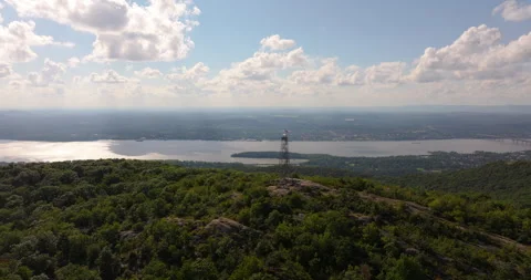 Fire lookout tower fly over on Mount Beacon in New York Stock Footage 346408650