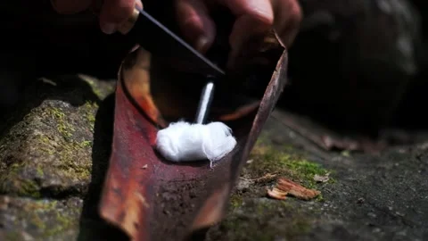 Fire from Magnesium fire starter Stock Footage 297545300