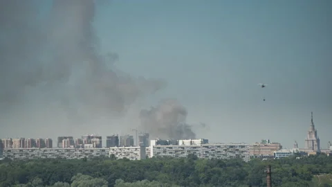 A fire in Moscow, which is extinguished by helicopters Stock Footage 200687554