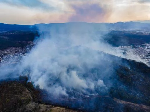 Fire on a mountain climate warming concept Foto stock