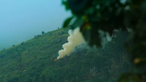 Fire in mountain forest. aerial view forest fire and smoke on hills. wild fir Stock Footage 121106361