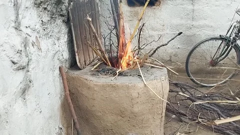 Fire in Muddy stove 動画素材 268855765