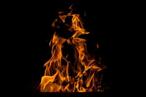 Fire. Natural element on the black background. Stock Photos