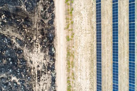 Fire next to solar panels Stock Photos