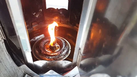 Fire from oil lamps in the temple. Stock Footage 121069484
