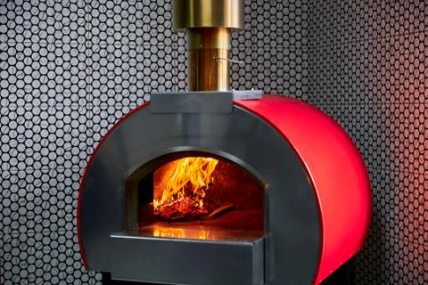 Fire in the oven. Traditional Pizza oven Stock Photos