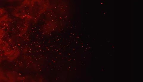 Fire particles debris isolated on black background for text or space . Film e Stock Illustration