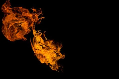 Fire patterns. Flames on a black background. Fiery patterns. Burning flame. B Stock Photos