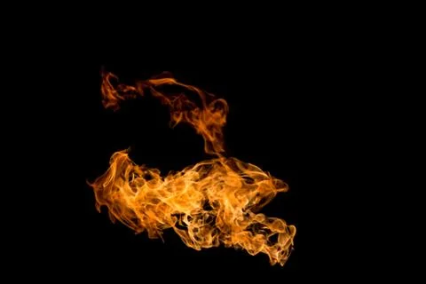 Fire patterns. Flames on a black background. Fiery patterns. Burning flame. B Stock Photos