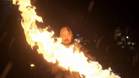 Fire performance with powerful flamethrower. Strong and expressive showman Stock Footage 120692578