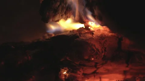 A fire at a picnic in the evening, out of focus Stock Footage 55690121