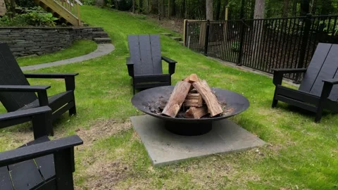 Fire pit chairs back yard country home leisure camping campfire outside deck Stock-Footage 278287154