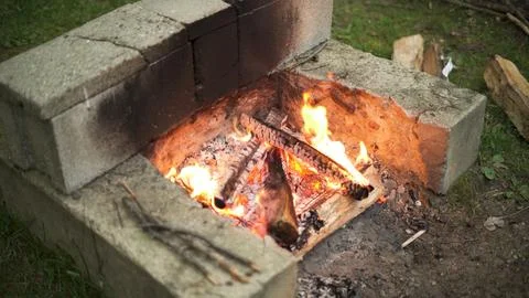 Fire in Pit during the Day Stock Photos