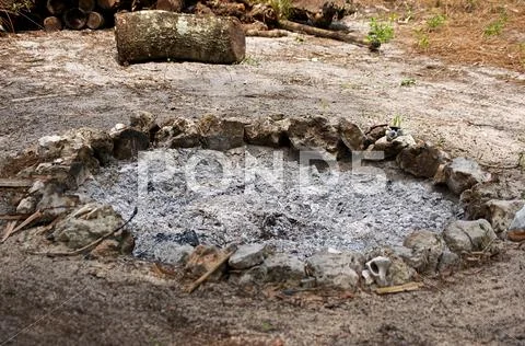 Fire pit filled with burnt ash Stock Photos
