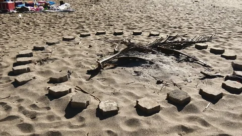 Fire pit in sand Stock Footage 126878813