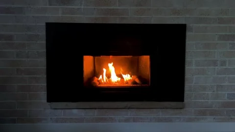 Fire place with grey brick surrounding  Stock Footage 249126981