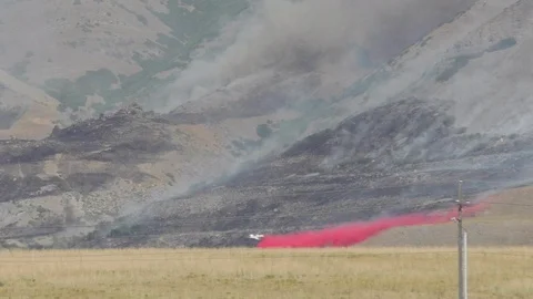 Fire plane air drop Stock Footage 115347281