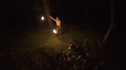 Fire poi man performing fire dance at night Stock Footage 72506944