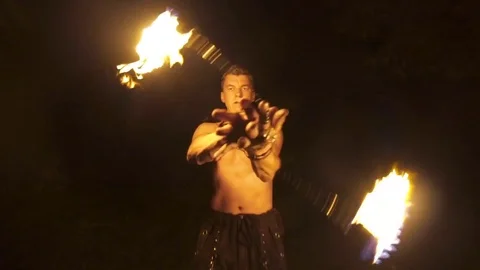 Fire poi man performing fire dance in forest at night 스톡 동영상 72507067