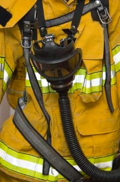 Fire protective suit with gasmask Stock Photos