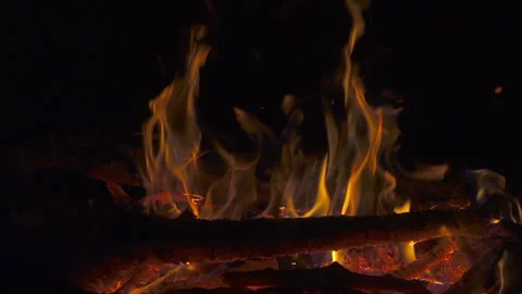 Fire on red-hot coals slow motion. Full HD video clip Stock Footage 98138719