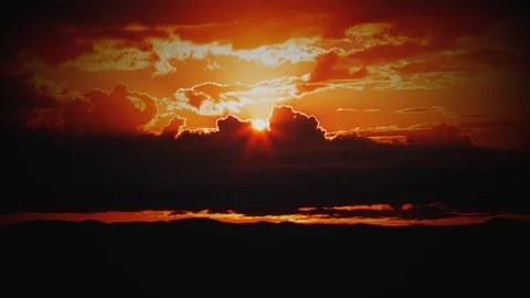 Fire Red Sunrise behind Storm Clouds Zoom In Time-lapse Stock Footage 127185487