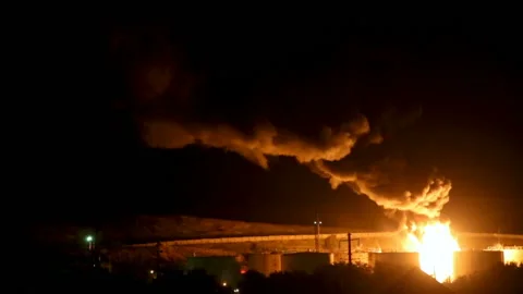 Fire at the refinery at night Stock Footage 99339813