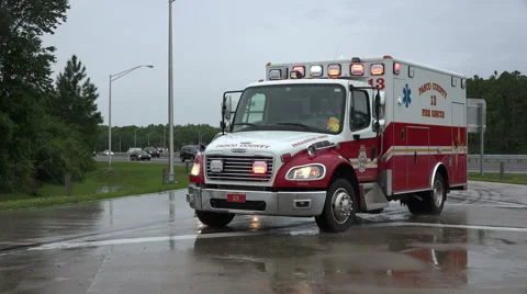 Fire Rescue Ambulances Arrive At Scene On Rainy Day Stock Footage 48677910