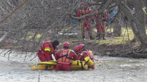 Fire Rescue Remove Body from River  Stock Footage 60635705