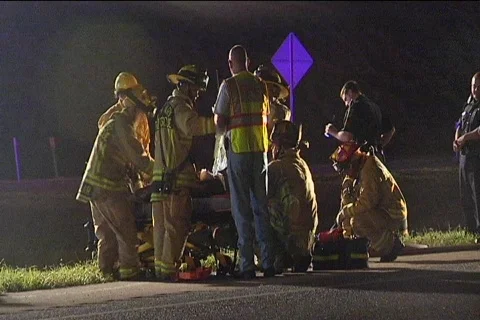 Fire Rescue Team Help Man on Side of Road 動画素材 857497