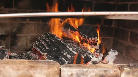 The fire to roast the meat is not ready yet Stock Footage 239108671