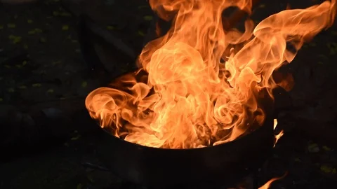 Fire roasted cooking Ancient grain Stock Footage 128690292