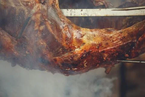 A fire roasted whole lamb Stock Photos