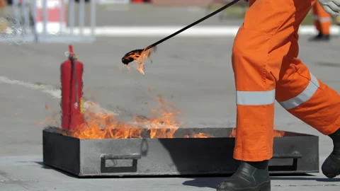 Fire safety training with open flame tray Stock Footage 321314539