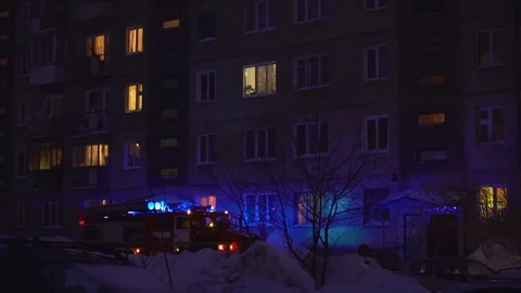 Fire Scene at night with fire trucks and flashing lights on the street Video stock 86628911