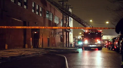 Fire scene tilt down to hose Stock Footage 644802