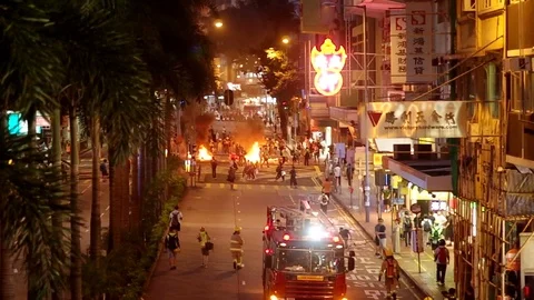 Fire is set during the Hong Kong riot 2019 Video stock 115988474
