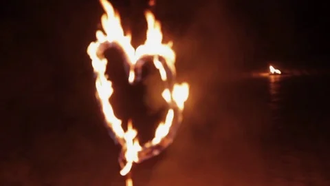 Fire in the shape of a heart on the fireshow Stock Footage 74622653