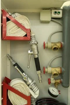Fire shield. Fire hoses, fire hydrants, fire hoses. Stock Photos
