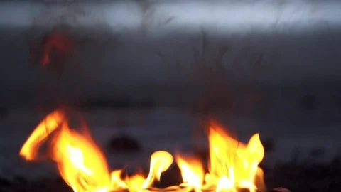 Fire shot up close against blurred street backdrop Stock-Footage 104058024